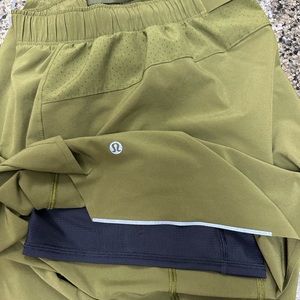 Green, Like new, mens 6” lululemon shorts. Built in liner.